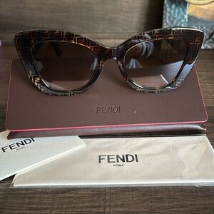Fendi slightly cat eye sunglasses in FF print